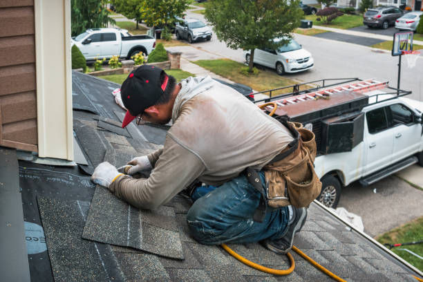 Professional Roofing technician working in Timnath, CO